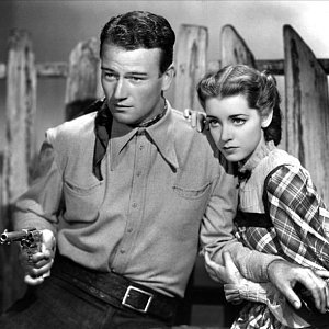 Джон Вейн с револьвером Colt